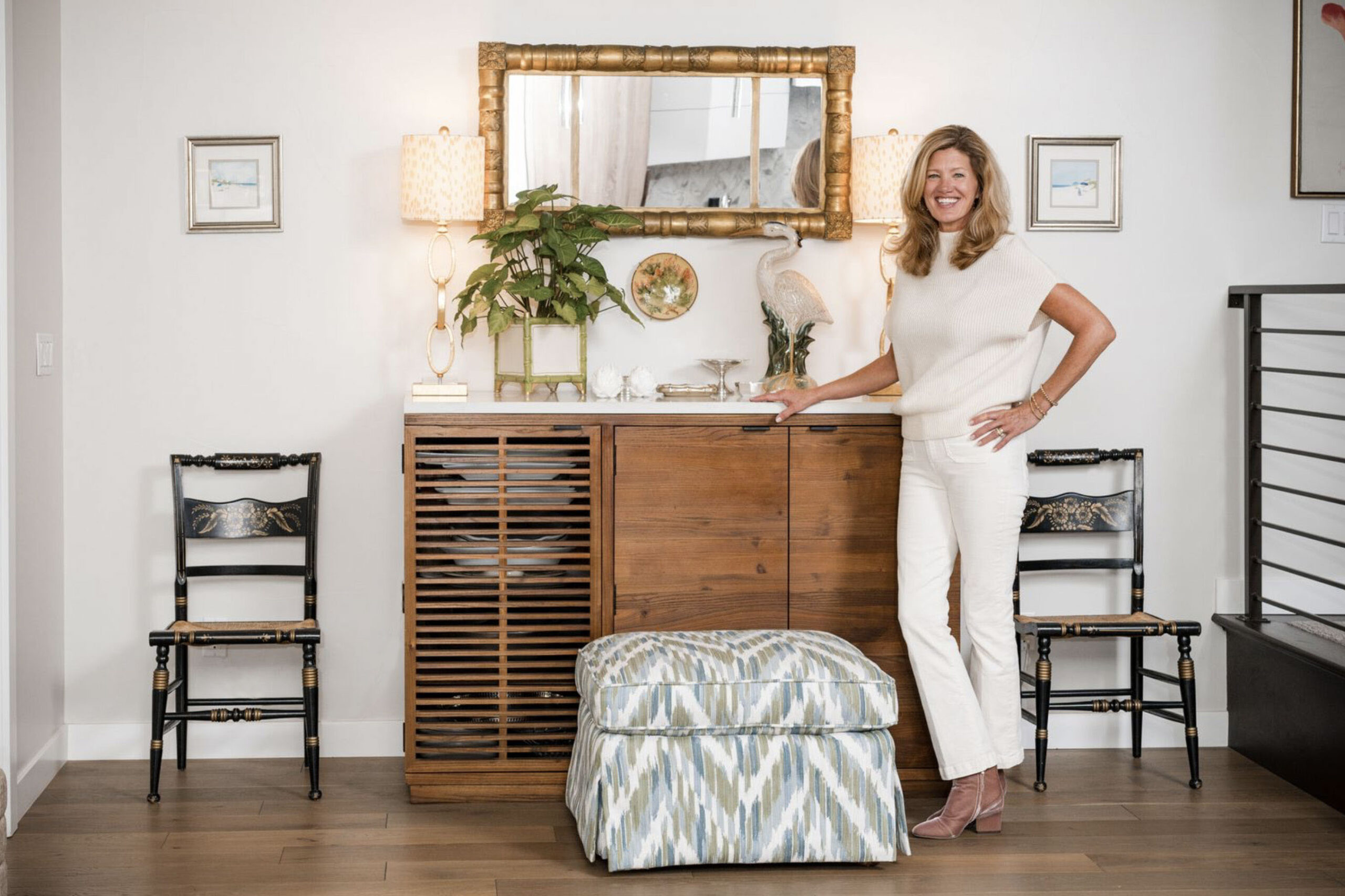 Ellen Erickson standing by buffet